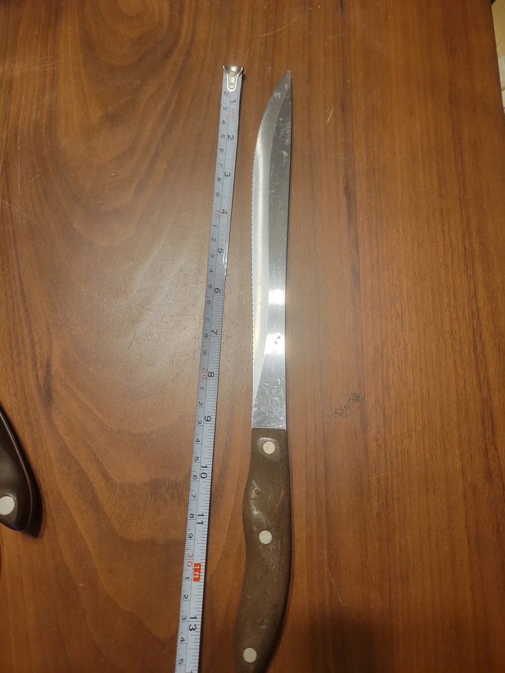 Cutco Wood-Handled Carving Knife in Brown and Silver